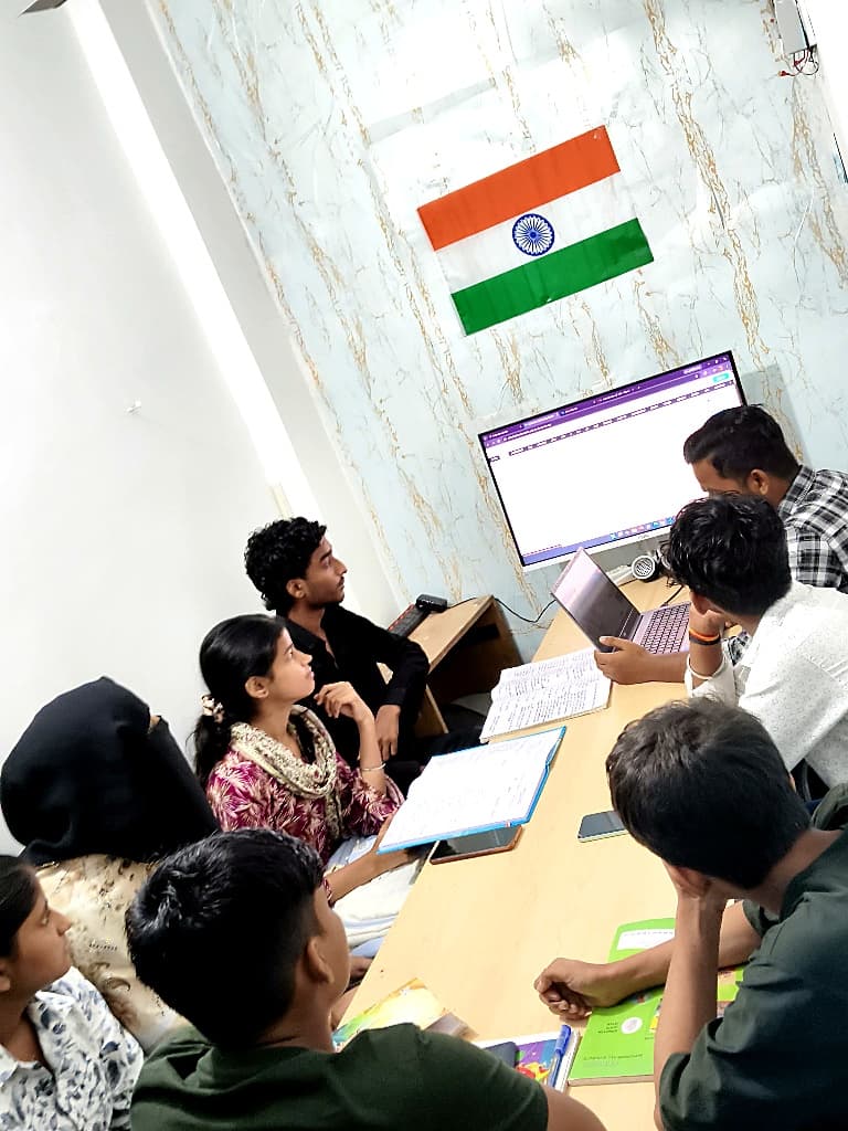 Students participating in classroom discussions and live project review