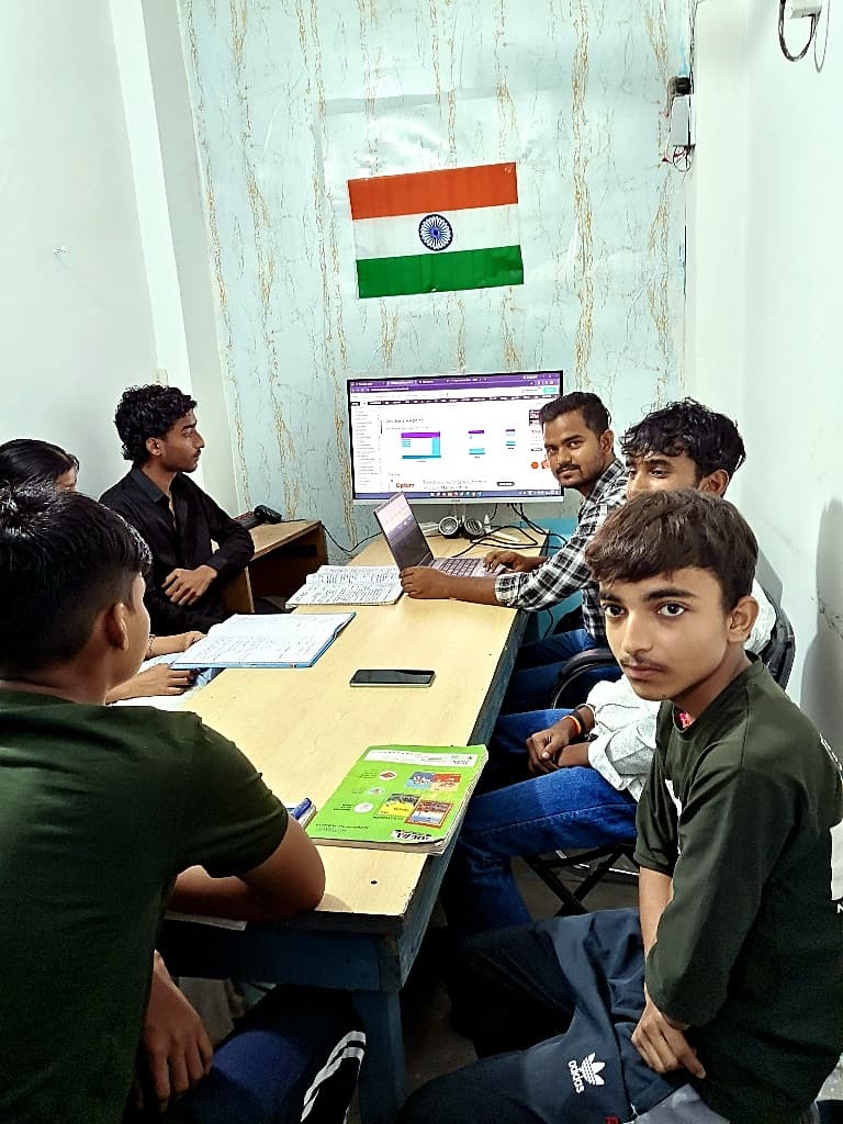 Students attending interactive web development and computer training batch
